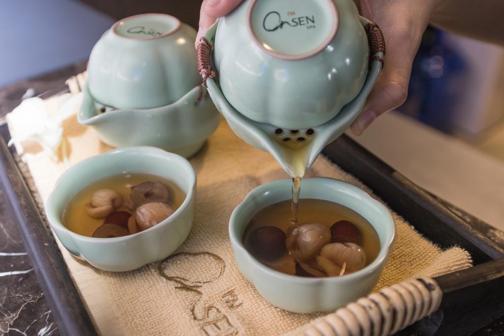 I'M Hotel Makati City Exterior photo Tea being poured into a gaiwan